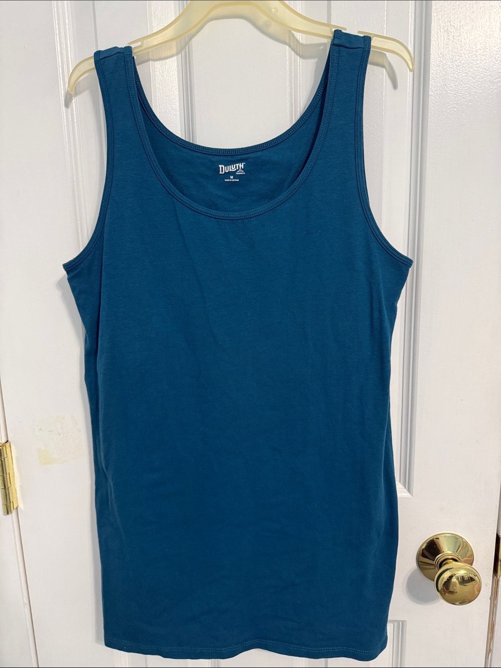 Duluth size medium, beautiful blue tank top with a built-in shelf bra